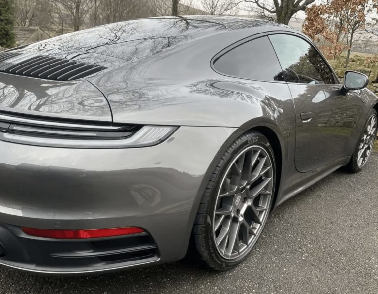 Showroom detail — multi-stage premium finish on a Manchester car